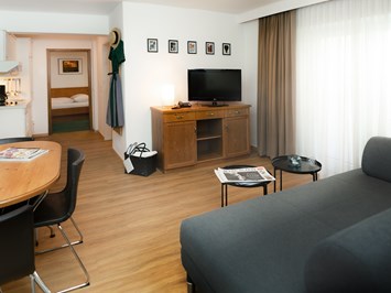 The RESI Apartments "mit Mehrwert" Zimmerkategorien 3-Raum Appartement Gartenseite