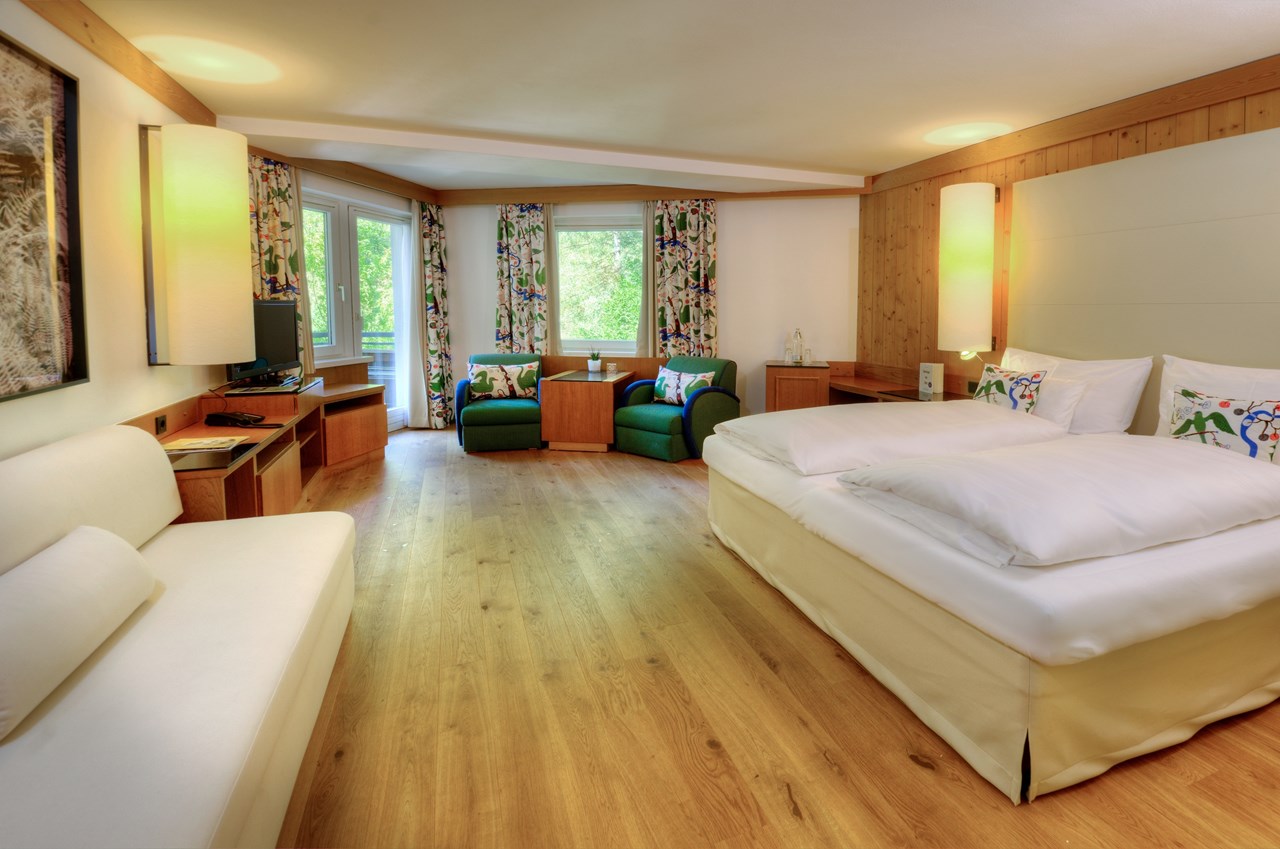 Gartenhotel Theresia****S - das "Grüne" authentische Hotel Zimmerkategorien Wohn-Schlafzimmer "Reiterkogel"