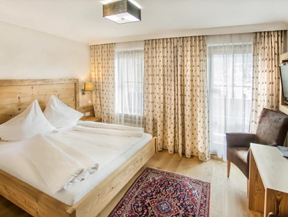 Hundehotel - Pools: Schwimmteich - Kuschelzimmer - Familien und Vitalhotel Mühlpointhof ***S