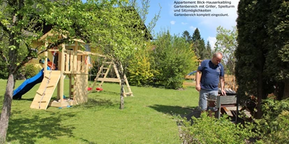 Hundehotel - in einer Ferienanlage/Wohnanlage - Großarl - Garten Spielturm mit Sandkiste - Appartement Mama