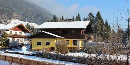 Hundehotel - Tauplitz - Außenansicht Appartement Mama im Winter - Appartement Mama
