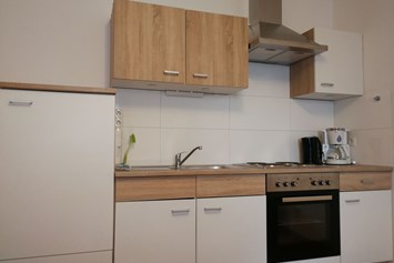Ferienhaus mit Hund: Küche Ferienwohnung - Schusterbauer Koppl 