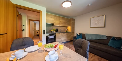 Hundehotel - Mariastein (Mariastein) - Wohzimmer + Küche Top 3 und Top 6 - Appartements Fürstauer