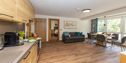 Hundehotel - Mariastein (Mariastein) - Wohnzimmer + Küche Top 5 und Top 8 - Appartements Fürstauer