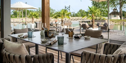Hundehotel - Pools: Schwimmteich - Gourmetrestaurant "die Möwe" am hauseigenen Badesee - VILA VITA Pannonia