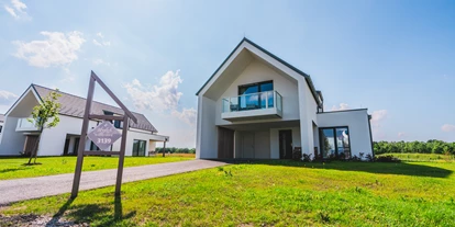 Hundehotel - Pools: Schwimmteich - Residenzen am See - parkside 
Vorderansicht - VILA VITA Pannonia