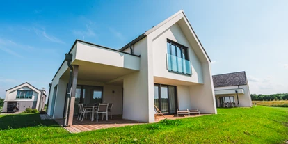 Hundehotel - Pools: Schwimmteich - Residenzen am See - parkside 
Terrasse/Garten - VILA VITA Pannonia