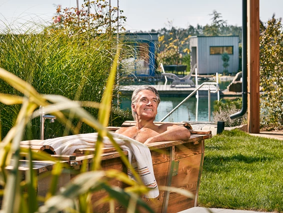 Ferienhaus mit Hund: Feuwerwasserwanne - Kittenberger Chalets am Gartensee