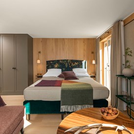 Urlaub-mit-Hund: Zimmer im alpinen Stil - Hotel Schranz 