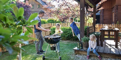 Hundehotel - in einer Ferienanlage/Wohnanlage - Großarl - Das Dorf in der Stadt - Grillen im eigenen Garten - Das Dorf in der Stadt