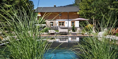 Hundehotel - in einer Ferienanlage/Wohnanlage - Großarl - Das Dorf in der Stadt - Naturschwimmteich - Das Dorf in der Stadt