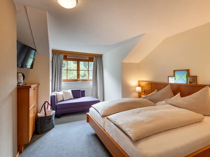 Hundehotel - Trink-/Fressnapf: an der Rezeption - Schruns - Kuschelzimmer - Relax und Vitalhotel Adler