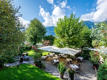 Hundehotel - Trink-/Fressnapf: an der Rezeption - Schruns - Hotelgarten  - Relax und Vitalhotel Adler