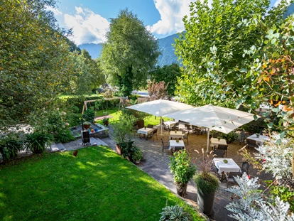 Hundehotel - Trink-/Fressnapf: an der Rezeption - Schruns - Hotelgarten  - Relax und Vitalhotel Adler