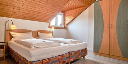 Hundehotel - Unterkunftsart: Hotel - Dackenheim - Apartment & Landhotel Zum Storchennest
