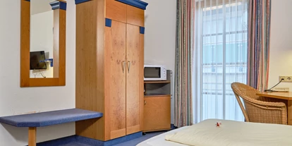 Hundehotel - Unterkunftsart: Hotel - Dackenheim - Apartment & Landhotel Zum Storchennest