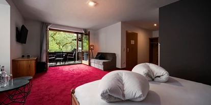 Hundehotel - Pools: Schwimmteich - Zimmer Sonntagshorn - Naturhotel Schütterbad