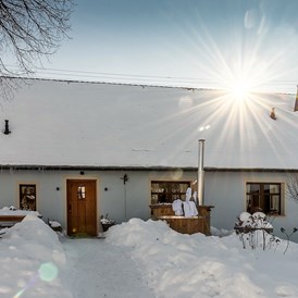 Ferienhaus mit Hund: Landhaus Chalet für 2 Personen
Terrasse im Winter - Das MUSSEA Landhaus Chalet & Scheunenloft