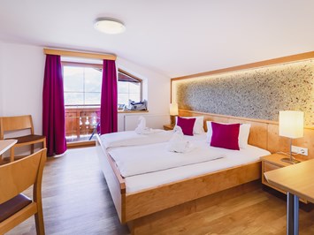Panorama Guggenbichl - Hotel Garni & Appartement Zimmerkategorien Familienzimmer Deluxe