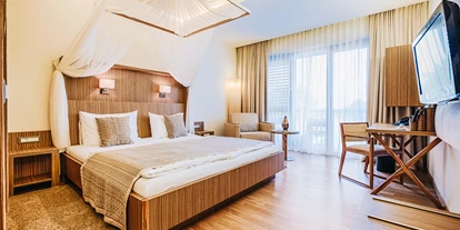 Hundehotel - Hundewiese: nicht eingezäunt - Neusiedler See - Doppelzimmer Seewinkel - St. Martins Therme & Lodge 4* Superior