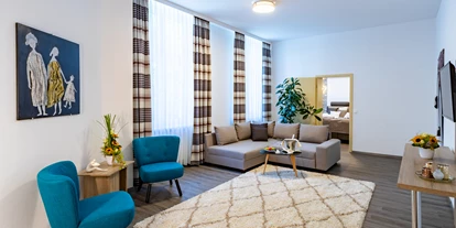 Hundehotel - Ladestation Elektroauto - Dipperz - Wohnbereich Parksuite - Boutique Hotel Badehof