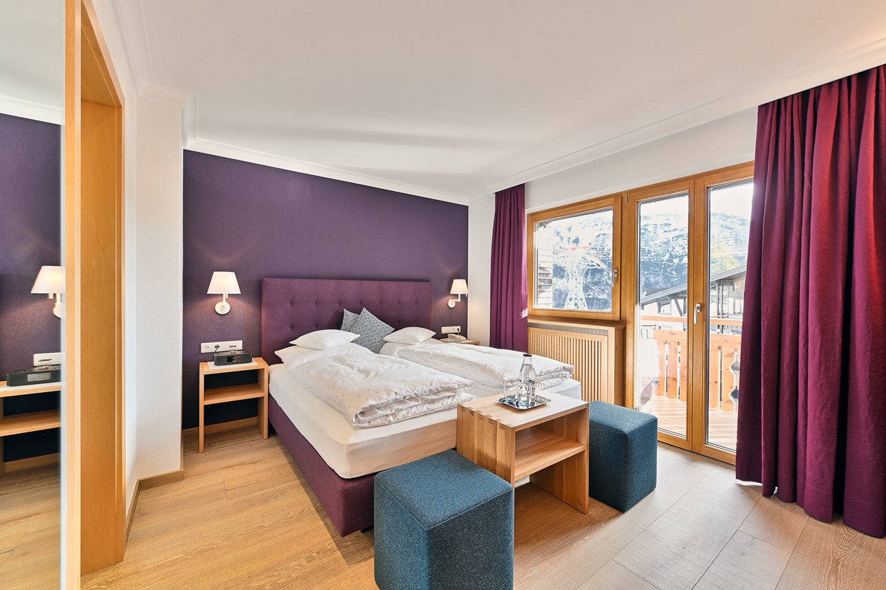 Sporthotel Petersboden & Chalet Hohe Welt - luxury apartments Oberlech Zimmerkategorien Petersboden: Komfort Doppelzimmer mit Balkon (ca. 25m²)