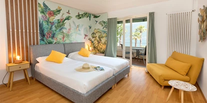 Hundehotel - Unterkunftsart: Hotel - Bodio TI - Superior Zimmer mit Balkon und Seeblick - Garden Hotel Primavera