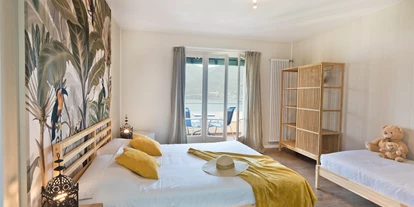 Hundehotel - Unterkunftsart: Hotel - Bodio TI - Superior Zimmer mit Balkon und Seeblick - Garden Hotel Primavera