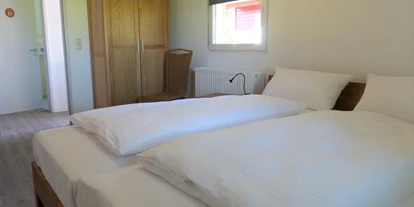 Hundehotel - Unterkunftsart: Appartement - Mecklenburg-Vorpommern - Schlafzimmer Blockhütte - Bernsteinland Barth