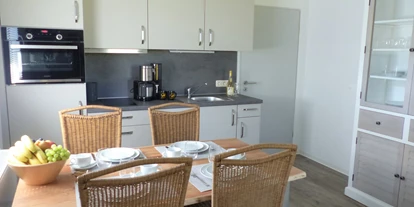 Hundehotel - Unterkunftsart: Appartement - Mecklenburg-Vorpommern - Essbereich Blockhütte - Bernsteinland Barth