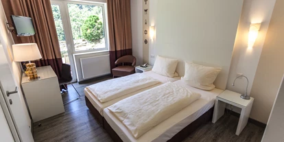 Hundehotel - Ladestation Elektroauto - Sauerland - Zimmerbeispiel FLiegendes Klassenzimmer - Hotel Alte Schule
