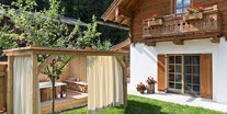 Hundehotel - PLZ 8972 (Österreich) - Chalet mit eigener Außenbadewanne - Feriendorf Holzleb'n