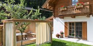 Hundehotel - PLZ 5771 (Österreich) - Chalet mit eigener Außenbadewanne - Feriendorf Holzleb'n