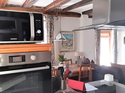 Hundehotel - Unterkunftsart: Hotel - Eifel - Hochwertig ausgestattete, moderne Küche mit Thermo-Mix und vielem mehr. - Wellness-Ferienhaus Maifelder Uhlenhorst mit Privat-Spa - Sauna, In- Outdoor-Whirlpool