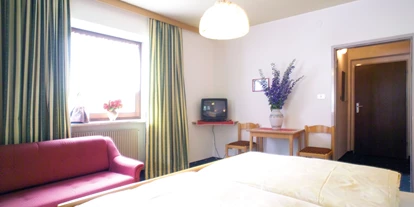 Hundehotel - Truden im Naturpark - Traditionell wohnen mit Blick in die Bergwelt - Hotel Martellerhof