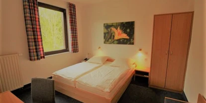 Hundehotel - Unterkunftsart: Hotel - Göttingen - Doppelzimmer im Gästehaus Waldeslust - Waldhotel Schäferberg